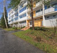Apartment building on Adlerova Street in Košice, Dargovských hrdinov, surrounded by greenery.