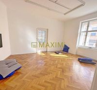 An empty room with a wooden floor decor in a 3-room apartment.