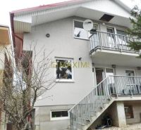Cottage on Mokráň Záhon in Bratislava - Ružinov, with an external staircase and a satellite dish.