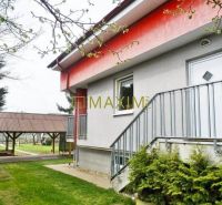 A cottage in Bratislava - Ružinov on Mokráň Záhon with a terrace and stairs.