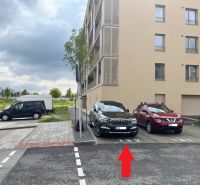 Parking lot near the building in Lamač, Bratislava, designated spot 132.