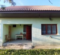 A family house in Veľké Úľany with an open terrace and a red roof.