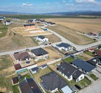 An aerial view of residential plots in Malý Slavkov surrounded by nature.