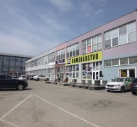 Commercial premises at Masarykova 22 in Prešov, showing a stone processing business with a parking lot.