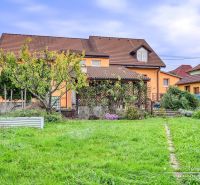 A family house in Špačince with a spacious garden, lawn, and terrace on Špačince street.