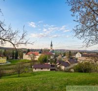 A view of the picturesque landscape with a sacred building and structures in Dolná Strehová.