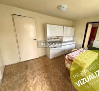 Interior of a family house with a dining table and cabinets, floor with wood decor.