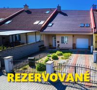 A family house in Rimavská Sobota with a garden, gate, and parking space.