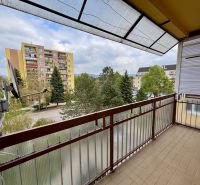 The balcony of a 3-room apartment on Valova Street in Piešťany with a view of apartment buildings and greenery.