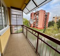 A balcony on Valova Street in Piešťany, overlooking residential buildings and greenery.