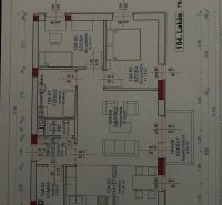 Floor plan of a 2-room apartment with a kitchen, living room, bedroom, and balcony.