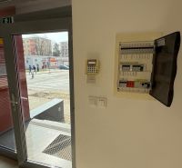 Entrance doors of commercial premises overlooking J. Šverma Street in the city of Zvolen.