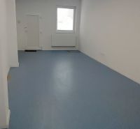 Interior with blue flooring within Warehouses and Halls.