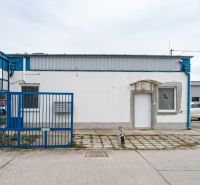 The blue gate leads to the industrial area on Bulharská Street in Trnava.