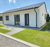 A family house in Kajal, with a lawn and terrace, ideal for living.