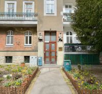 Entrance to an apartment building with a flower bed on Gajova Street in Bratislava - Old Town.