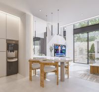 Interior of a villa with an open space, large windows, and a table with chairs.