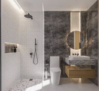 Bathroom with stone walls, shower, and sink in a stylish villa.