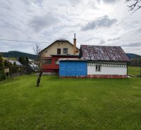 A family house on Vysoká nad Kysucou Street, Vysoká nad Kysucou, surrounded by a green lawn.