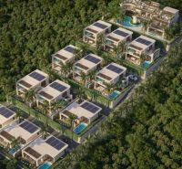 Construction of houses in Nungwi with swimming pools and solar panels, surrounded by greenery.