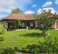A family house in Šamorín with a nicely landscaped garden and a garage.
