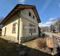 A family house in Nová Lesná with a visible facade and surroundings in a quiet street.