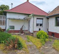 A family house on Trnovecká Street in Trnovec nad Váhom with a garden and a shelter.