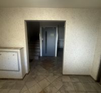Entrance hall with staircase and elevator in an apartment building on Mierová Street in Stará Ľubovňa.
