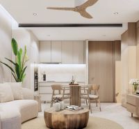 Living room in a two-room apartment with light furniture and a wooden decor floor.