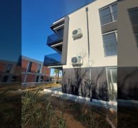 Exterior of a holiday apartment in Privlaka, Privlaka Street, with a new facade and balcony.