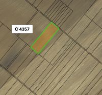 Aerial view of agricultural land in Veľký Šariš with a highlighted parcel.
