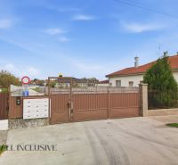 Gate with mailboxes, next to the house in Rohovce, Residential land.