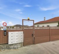 Gate and mailboxes on a residential property in Rohovce.