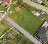 A plot for residential use in Rohovce marked in orange, surrounded by other houses and greenery.