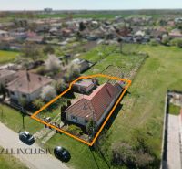 A family house on Vydrany Street in Dunajská Streda surrounded by greenery and a garden.