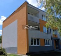 An apartment building in Smolenice offers a 3-room apartment, surrounded by greenery and blue skies.