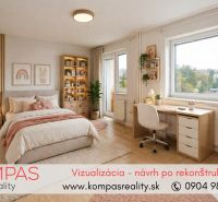 A bright bedroom with a bed, a desk, and a wooden-decor floor in a two-room apartment.