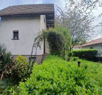 A family house surrounded by greenery in gardens on Havrania Street in Hamuliakovo.