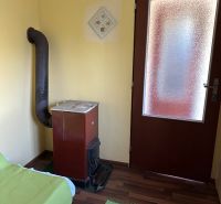 Bathroom with a stove, sofa, and wooden decor flooring in Gardens.