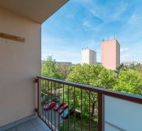 A balcony in a 2-room apartment on Južná trieda in Košice with a view of the surrounding buildings.
