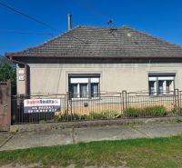 Family house in Tvrdošovce, fenced, with two windows and marked for sale.