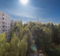 Sunset over the housing estate in Dubnica nad Váhom, Pod Hájom street, surrounded by greenery.