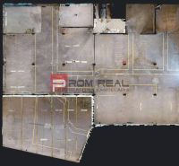 Floor plan of large warehouses and halls with parking markings and various spaces.