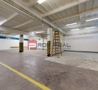 Warehouses and halls with high ceilings, marked stripes, and a ladder.
