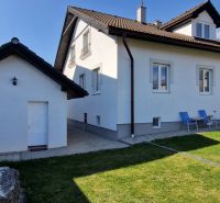 A family house in Spišský Štvrtok with a spacious garden and seating areas.