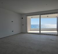 Open space with glass doors and sea view, 3-room apartment.