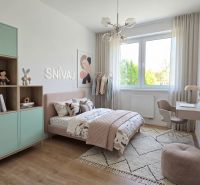 Children's room with pastel furniture in a 3-room apartment, floor with wooden decor.