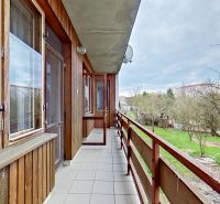 The balcony of a family house on 17. novembra Street in Stará Ľubovňa with a view of the garden.