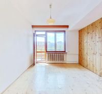 Interior of a family house with a wooden decor floor and a bright room.