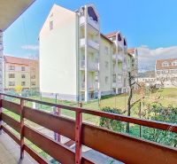 The balcony of a family house on 17th November Street in Stará Ľubovňa with a view of the apartment buildings.